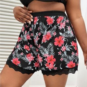 Tropical print lace trim bathing suit shorts